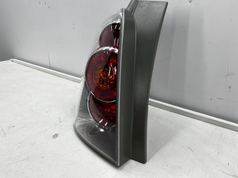 Lampa Toyota Corolla Verso II 04-07r. E121 NOWA lewa tylna EU Oryginalna w błotnik lewy tył 81561-0f020