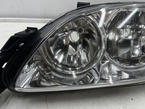 Lampa reflektor Toyota Avensis I T22 Lift 00-03r. NOWA lewa oryginał Europa jasna lewy przód 92101a2350