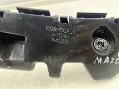 Ślizg Mazda 2 III DJ 14r- lewe przednie mocowanie wspornik uchwyt zderzaka d09h502j1