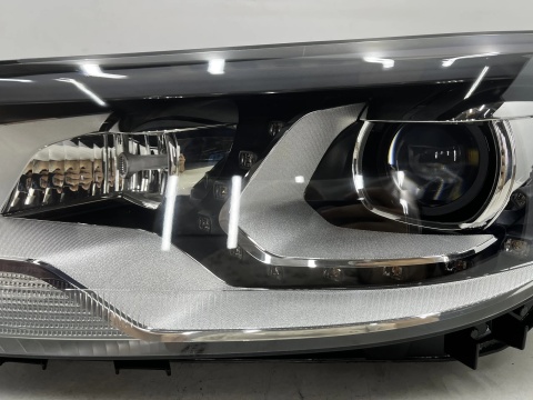 Lampa reflektor VW Tiguan 1 I 5n LIFT 10-16r. lewa przednia XENON EU skrętna doświetlanie zakrętów + Led oryginalna