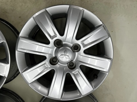 Felgi aluminiowe Mitsubishi Colt VI 6 Z30 04-12r. r15 cali 6jx15 ET46 4x114,3 CH67 felgi oryginalne KOMPLET 4250a756