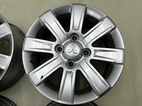 Felgi aluminiowe Mitsubishi Colt VI 6 Z30 04-12r. r15 cali 6jx15 ET46 4x114,3 CH67 felgi oryginalne KOMPLET 4250a756