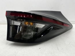 Lampa Toyota Yaris Cross 20r.- prawa tylna LED w błotnik oryginalna Europa 81550-0de10