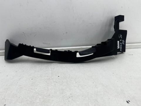 Ślizg Mazda 3 IV BP 19r.- prawe przednie mocowanie reflektora zderzaka uchwyt pod lampę prawy przód bcka-50151