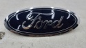 Znaczek Ford Kuga MK2 Lift 16-19r. przedni znaczek atrapy noska maski zderzaka emblemat logo przód ORYGNALNY gj54-8b262-aa