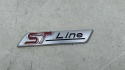 Znaczek Ford ST-line 20r.- 86x17mm. napis logo znaczek emblemat na błotnik klapę ORYGNALNY g1bb-16b114-aa
