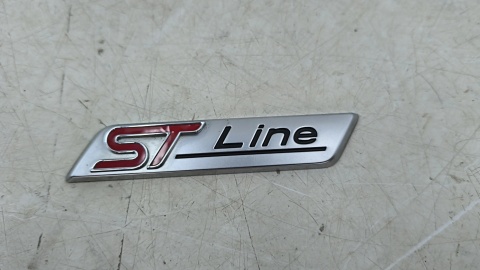 Znaczek Ford ST-line 20r.- 86x17mm. napis logo znaczek emblemat na błotnik klapę ORYGNALNY g1bb-16b114-aa