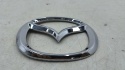 Znaczek Mazda MX-5 IV 15r.- przedni znaczek atrapy noska zderzaka emblemat przód ORYGNALNY n243-51741