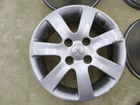 Felgi aluminiowe Mitsubishi Colt VI 6 Z30 04-12r. r16 cali 6,5jx16 ET48 4x114,3 CH67 felgi oryginalne KOMPLET mr594967