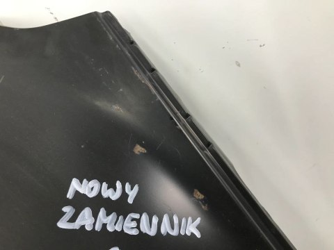 Błotnik Suzuki Grand Vitara 2 II 05-14r. lewy 57700-65810