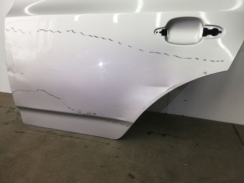 Drzwi Bmw X3 E83 04-10r lewy tył lewe tylne