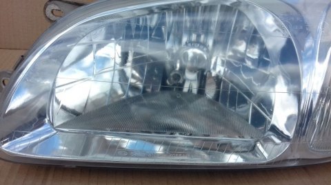 Lampa reflektor Kia Carnival 1 I 99-01r lewa przednia