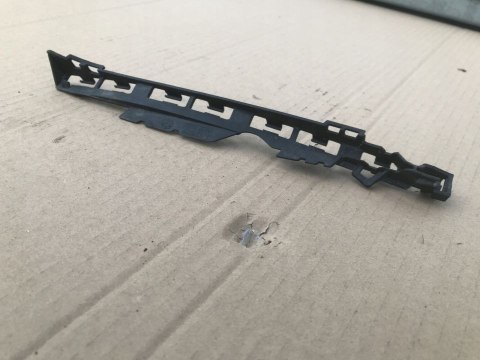 Ślizg Bmw 1 E87 E81 mocowanie wspornik uchwyt listwa maski lampy reflektora 71528029