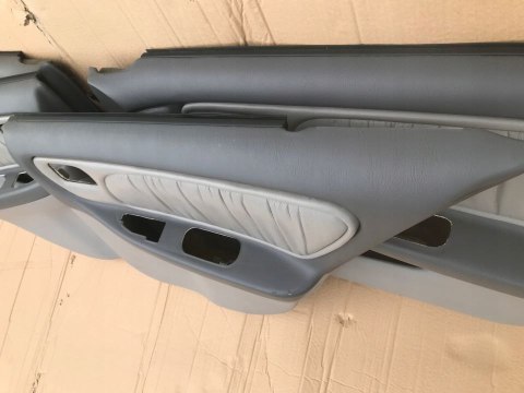 Tapicerka Nissan Altima L30 98-01r boczki drzwi komplet