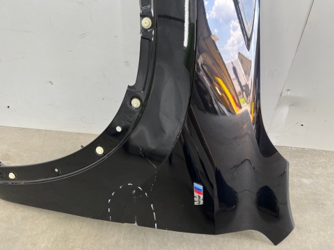 Błotnik BMW X1 U11 lewy 22r.-> 1300504