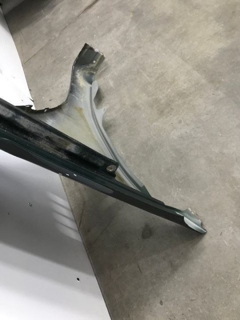 Błotnik Mitsubishi L200 lewy przedni 2006-2016r. 5220A817T