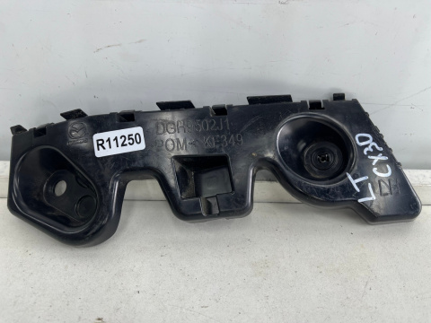 Ślizg Mazda CX-30 CX30 lewe tylne mocowanie zderzaka wspornik uchwyt dgh9502j1
